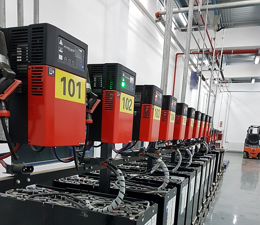 A battery charging system for forklifts at work.