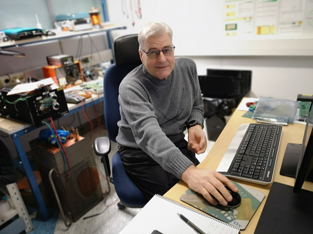 Employees are sitting at their computer